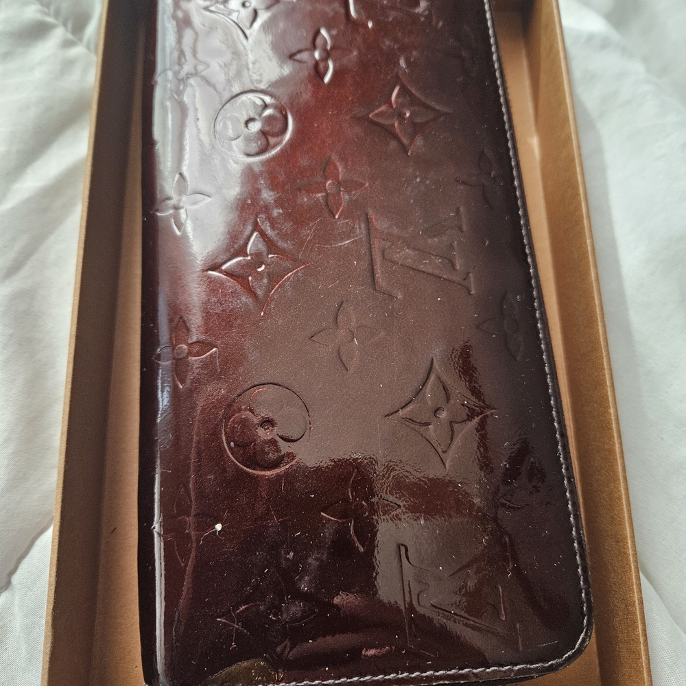 Louis Vuitton Embossed Leather Wallet
